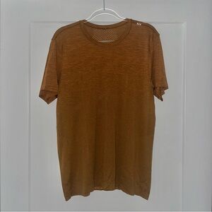 Lululemon men’s athletic vented short sleeve shirt in burnt orange / rust color